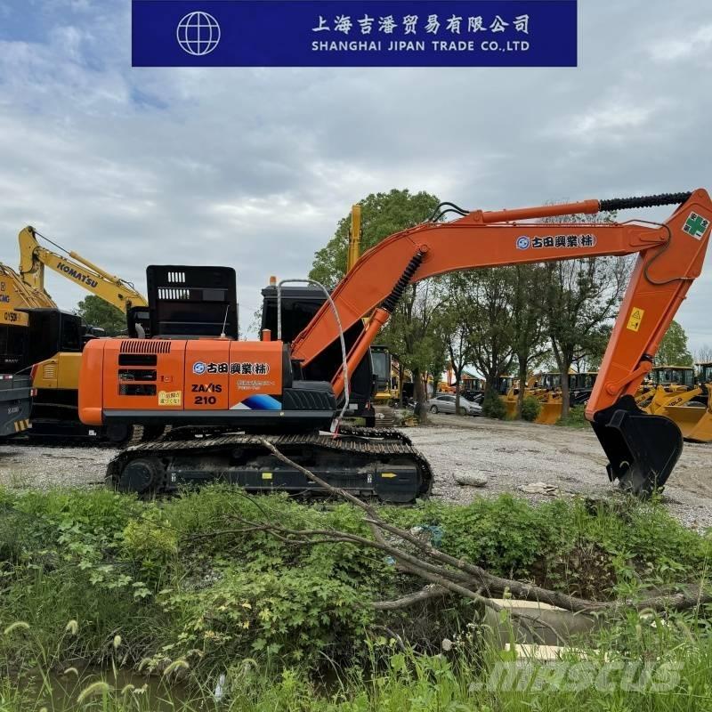 Hitachi ZX 210 Beltegraver