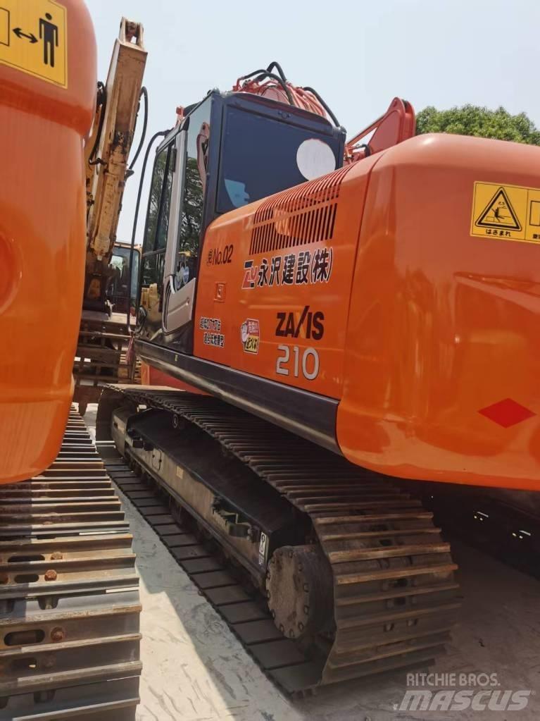 Hitachi ZX 210 Beltegraver