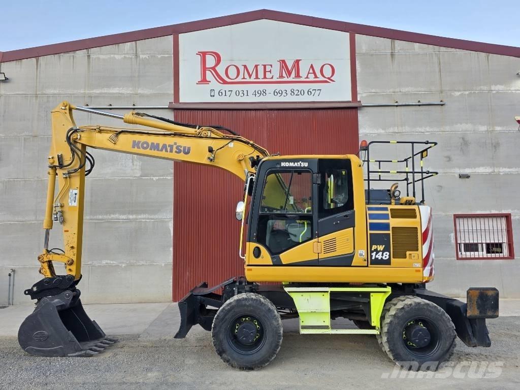 Komatsu PW 148-11 Dozere Beltegående