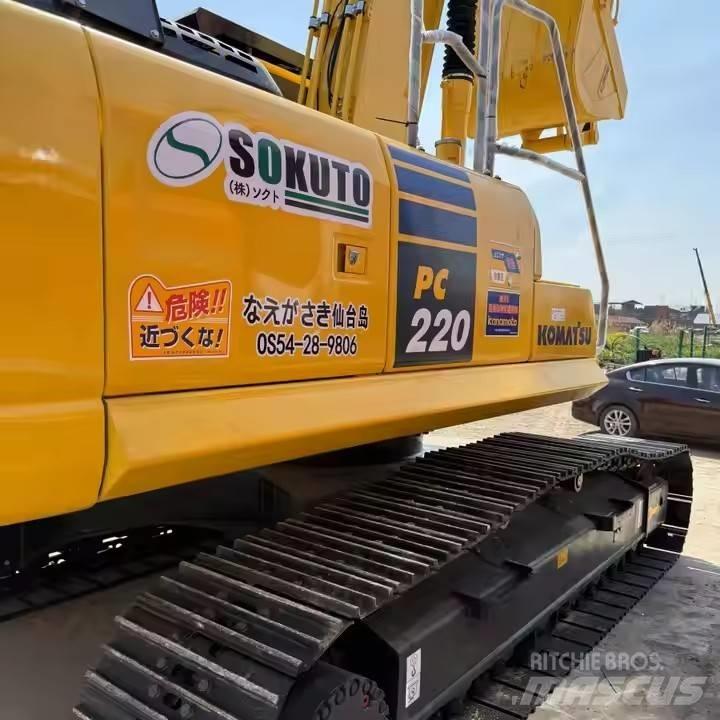 Komatsu PC220-8 Beltegraver