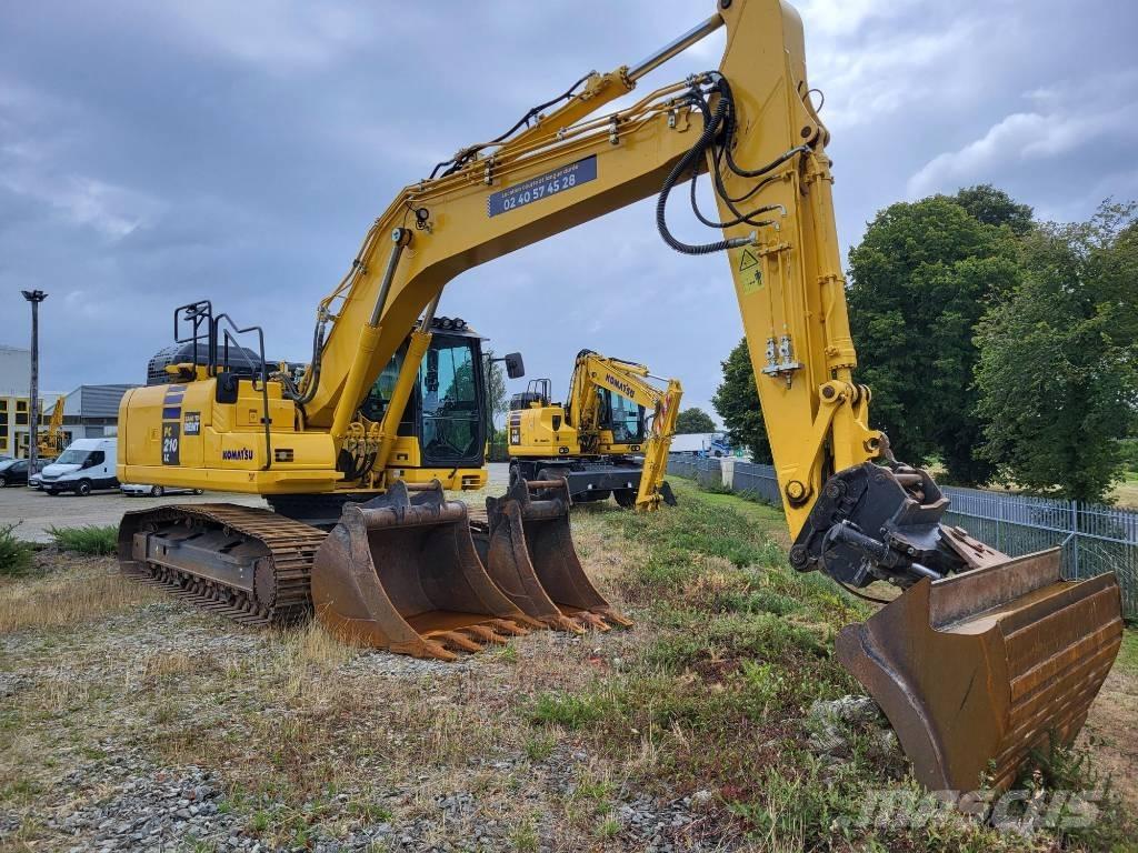 Komatsu PC210LC-11 Beltegraver