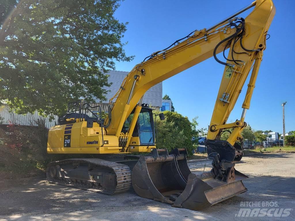 Komatsu PC210LC-11 Beltegraver