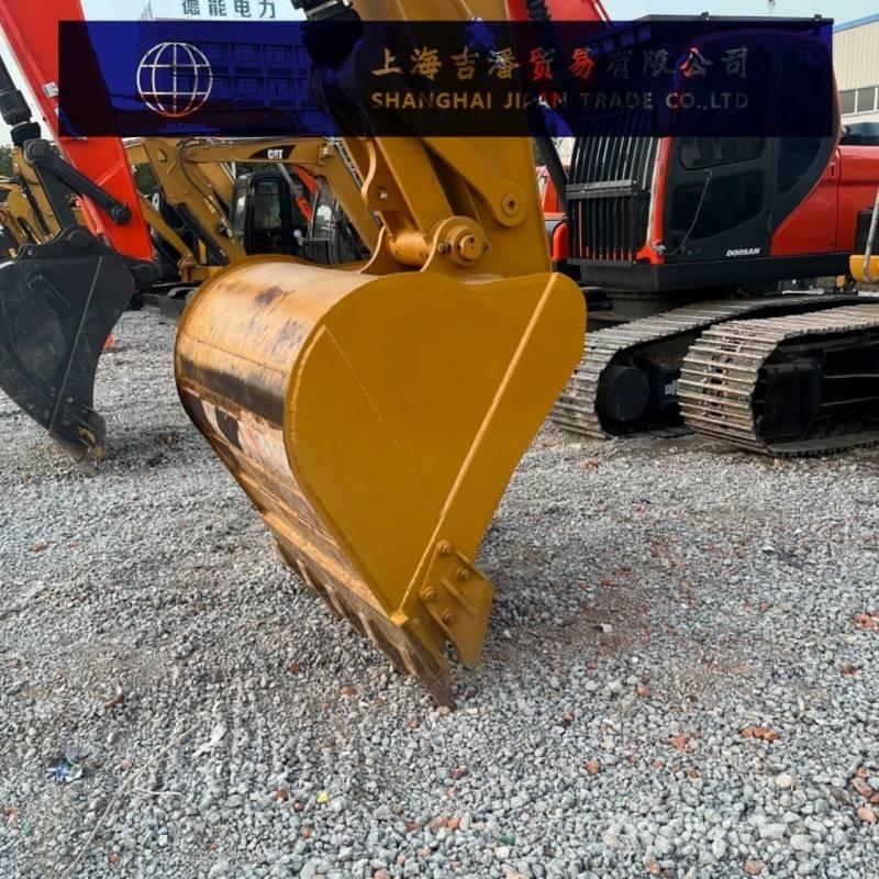 CAT 323 Beltegraver