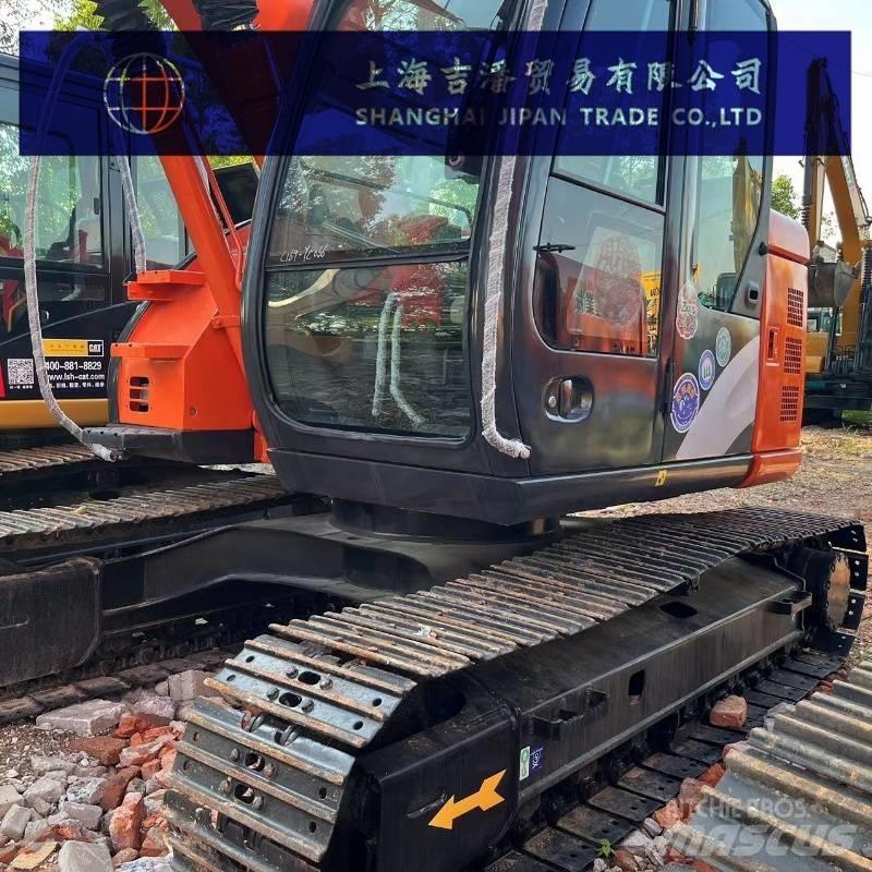 Hitachi ZX 135 Beltegraver