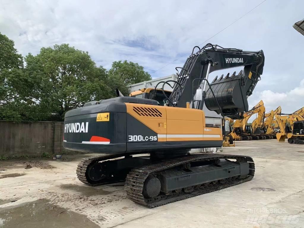 Hyundai R300LC-9S Beltegraver