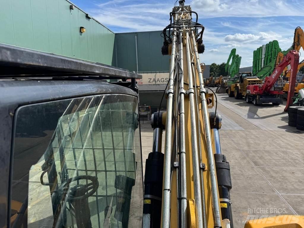 CAT MH3022 Gravemaskiner for avfallshåndtering