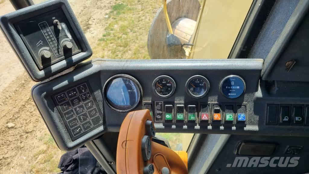 New Holland TC 56 Skurtreskere