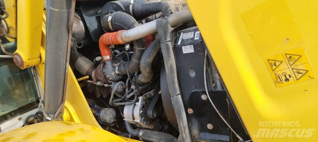 New Holland B 115 C Traktorgravere