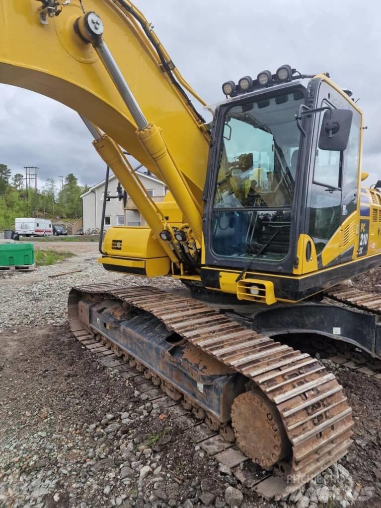 Komatsu PC 210 LC Beltegraver