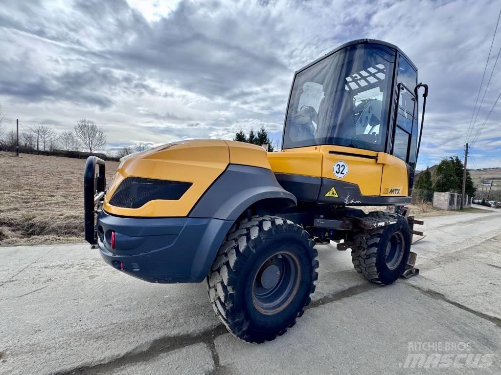Mecalac 12 M TX Traktorgravere