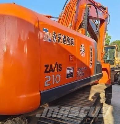 Hitachi ZX 210 Beltegraver