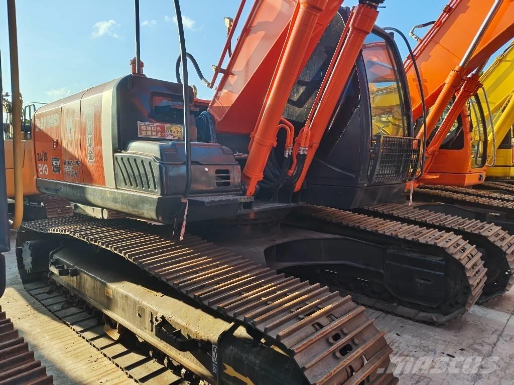 Hitachi ZX 210 Beltegraver