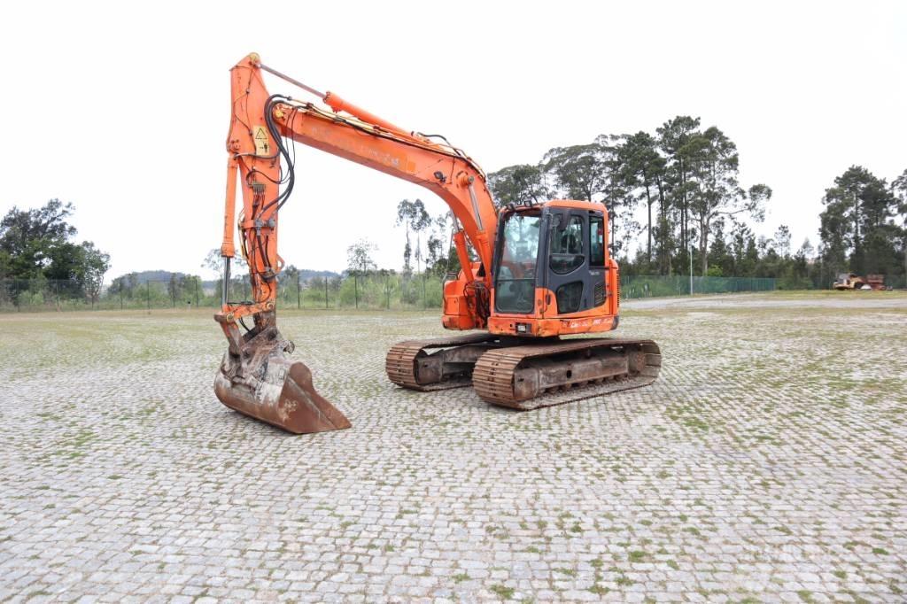 Komatsu PC138US-8 Beltegraver