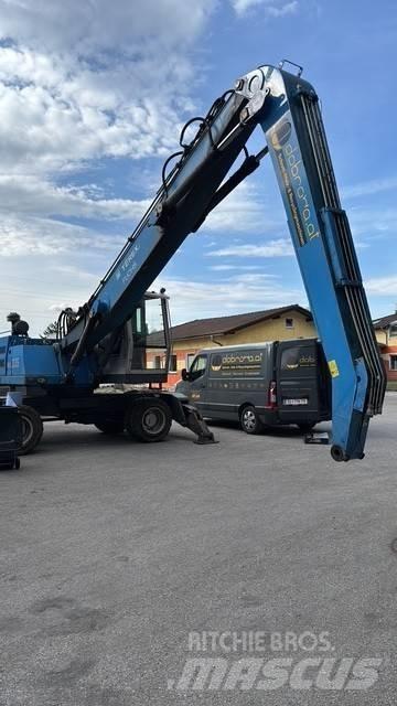 Fuchs MHL 335 Gravemaskiner for avfallshåndtering