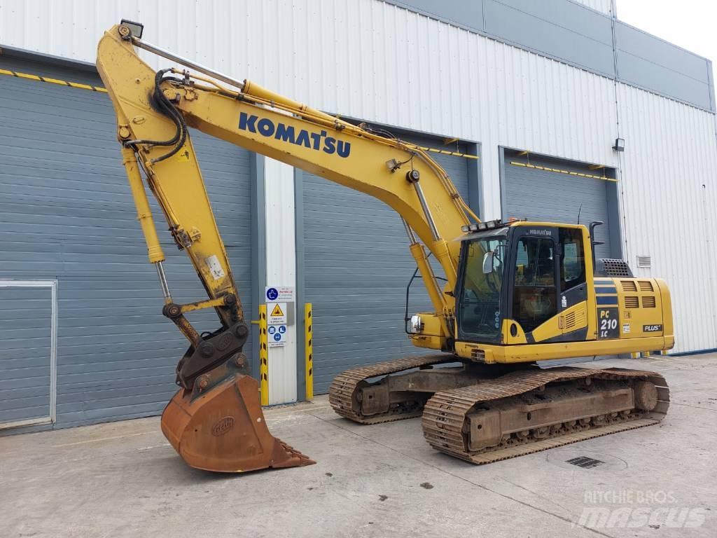 Komatsu PC210LC-10 Beltegraver