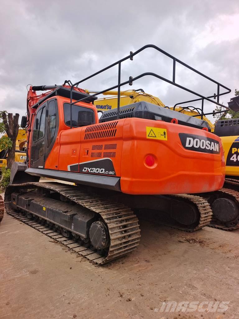 Doosan DX 300LC Beltegraver