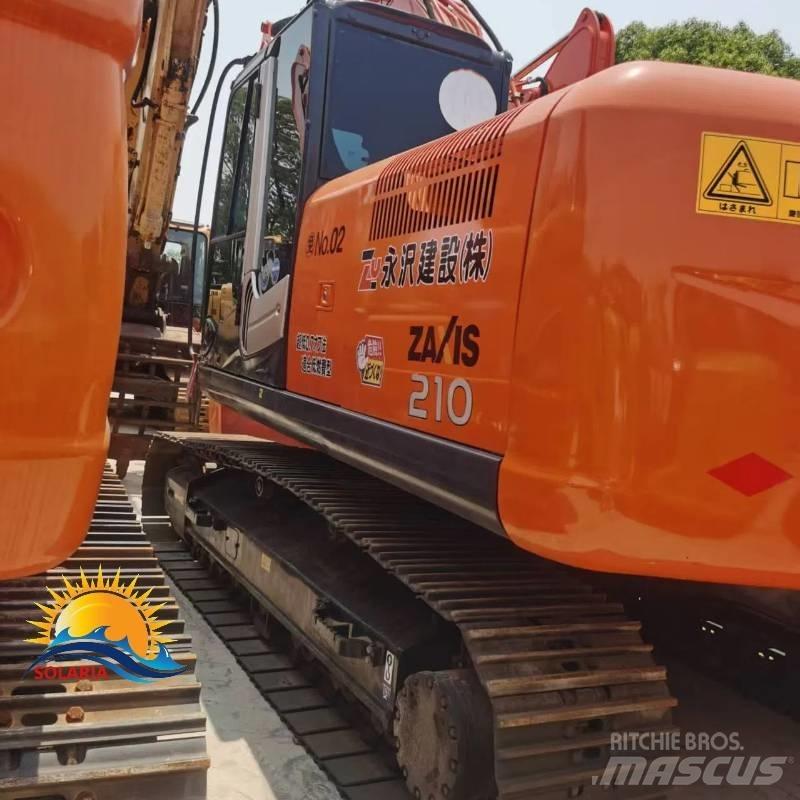 Hitachi ZX 210 Beltegraver