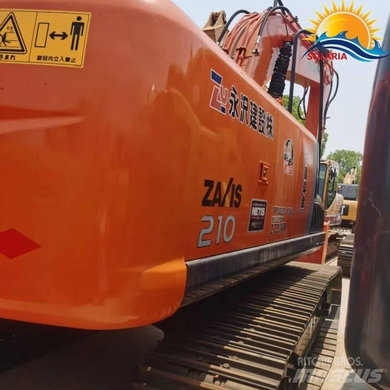 Hitachi ZX 210 Beltegraver