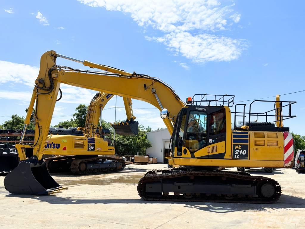 Komatsu PC210LC-11 Beltegraver