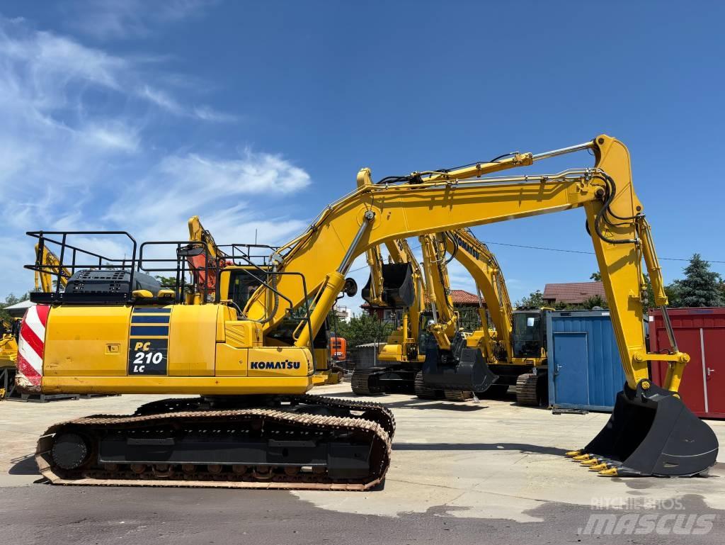 Komatsu PC210LC-11 Beltegraver
