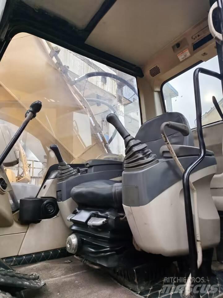 CAT 325C Beltegraver