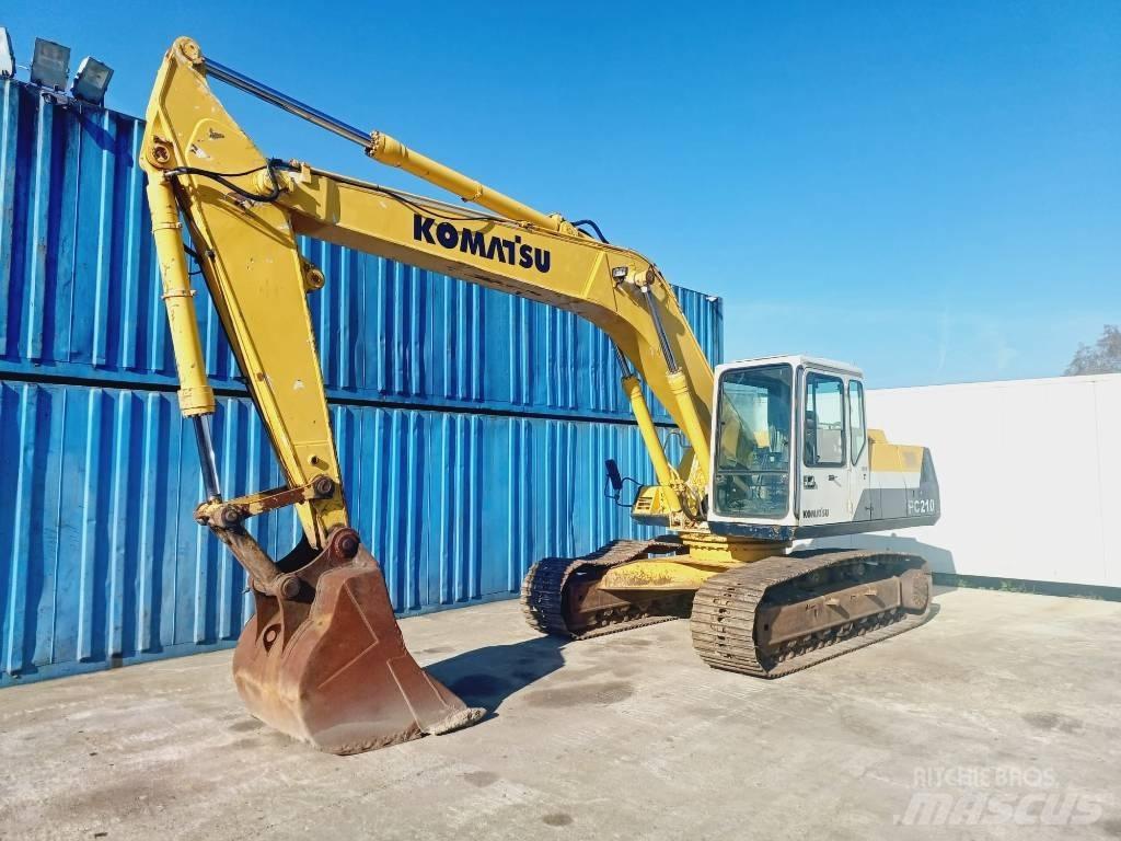 Komatsu PC 210-5 Beltegraver