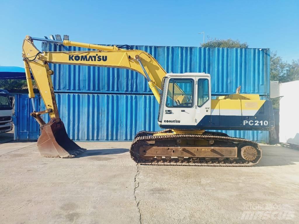 Komatsu PC 210-5 Beltegraver