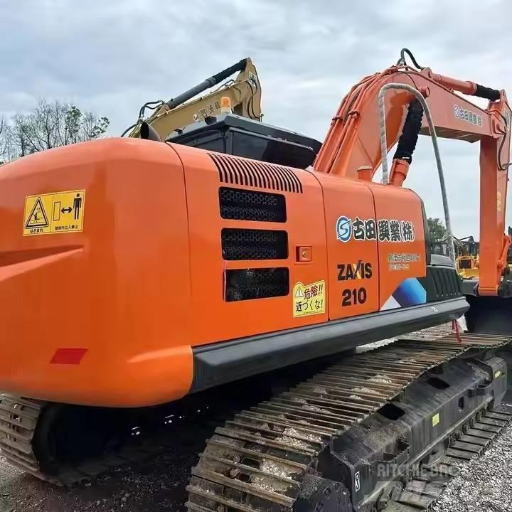 Hitachi ZX210 Beltegraver