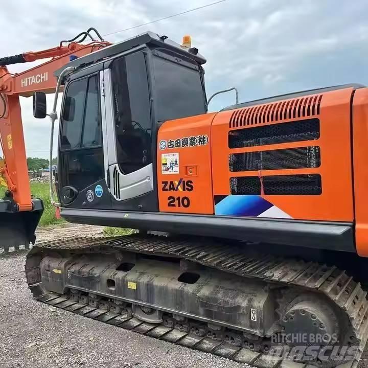 Hitachi ZX210 Beltegraver