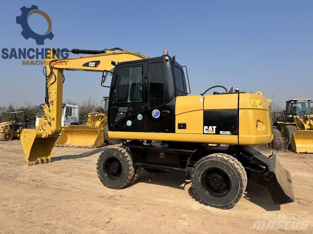 CAT M 320 D Hjulgravere