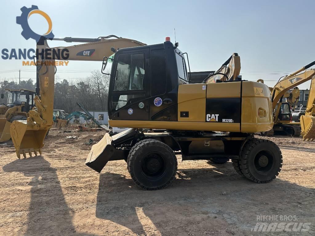 CAT M 320 D Hjulgravere
