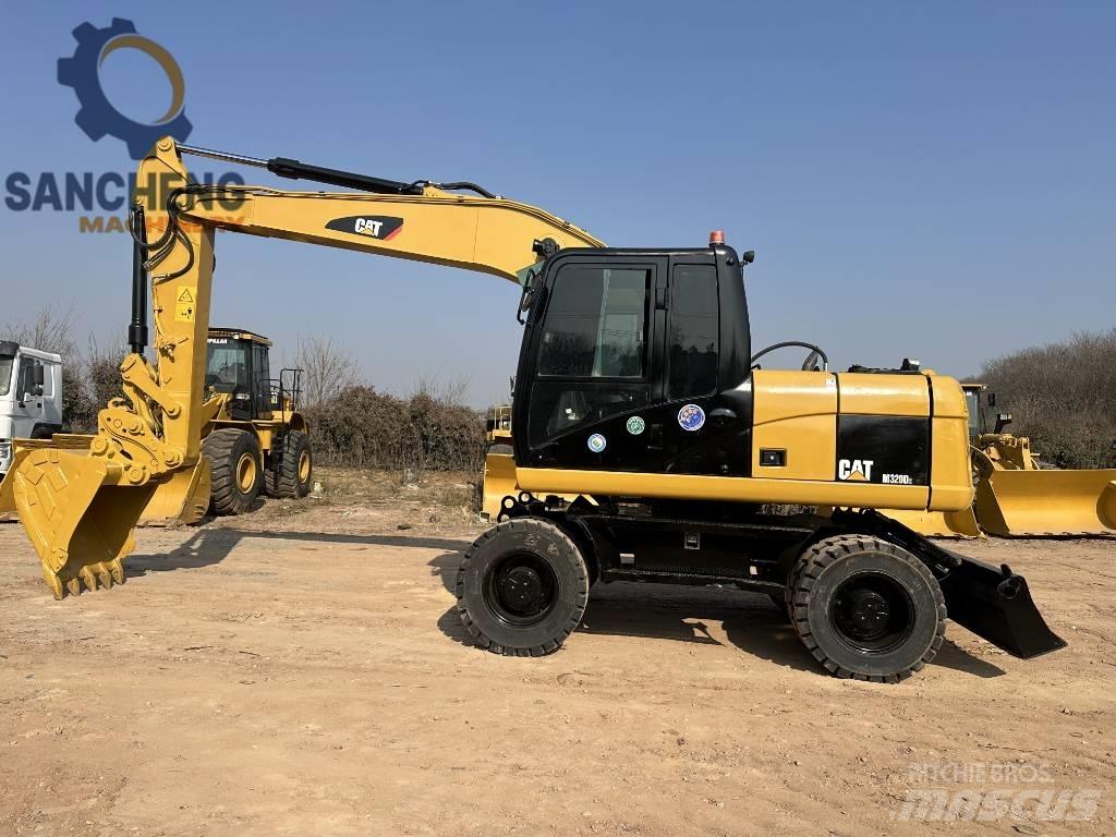 CAT M 320 D Hjulgravere