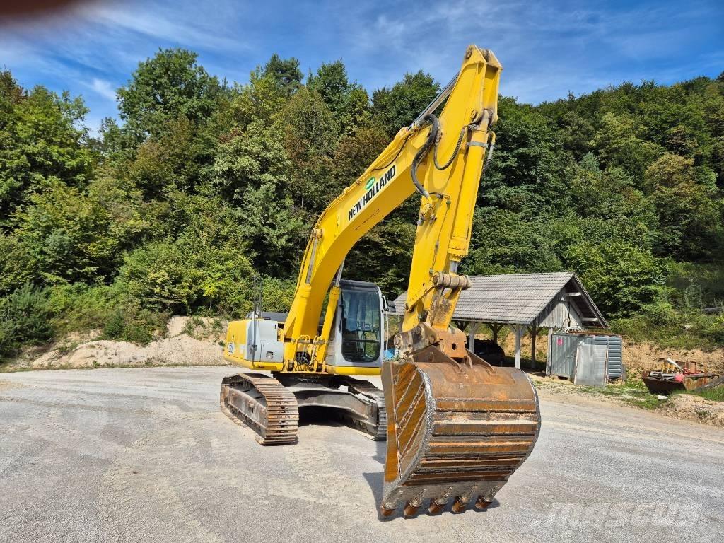 New Holland E 215 Beltegraver