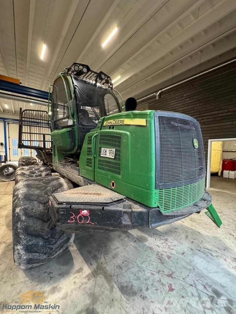 John Deere 1210E Lassbærere