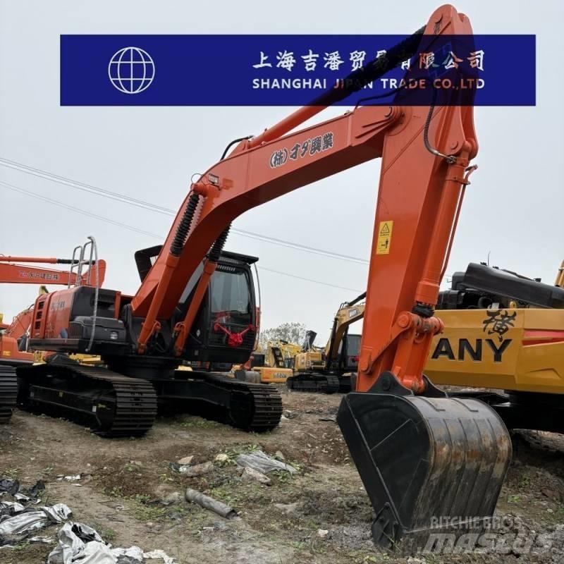 Hitachi ZX 210 Beltegraver