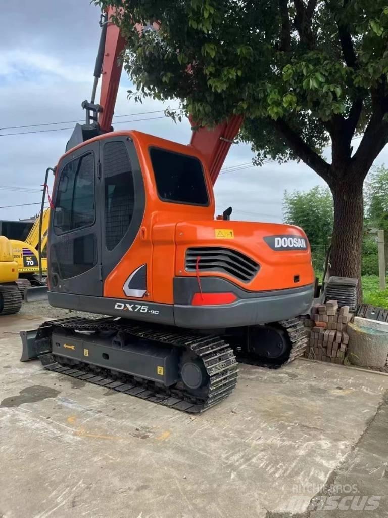 Doosan DX75-9C Beltegraver