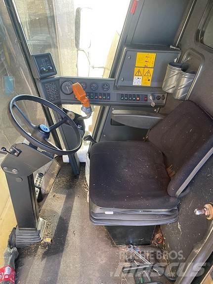 New Holland TC 56 Skurtreskere