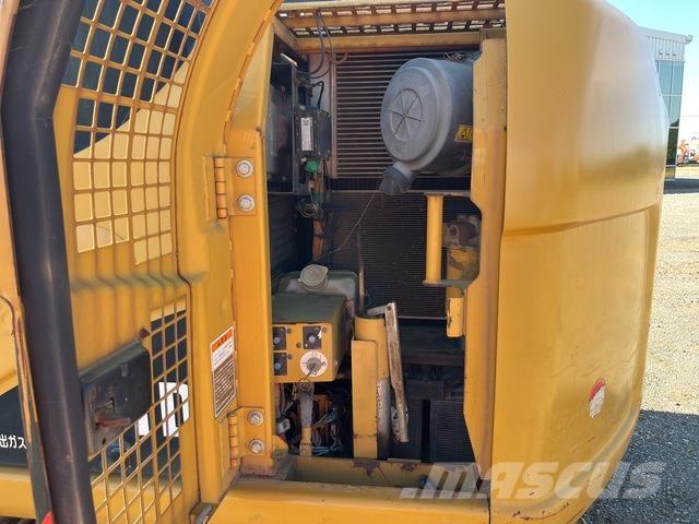 CAT 311D Beltegraver