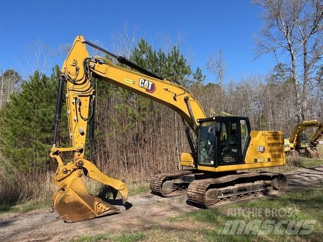CAT 323 Beltegraver