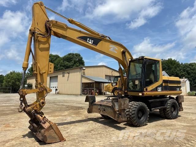 CAT M318 Hjulgravere