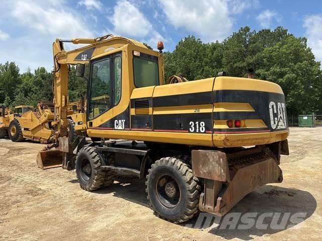 CAT M318 Hjulgravere