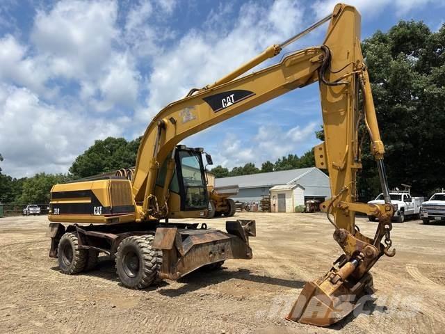 CAT M318 Hjulgravere