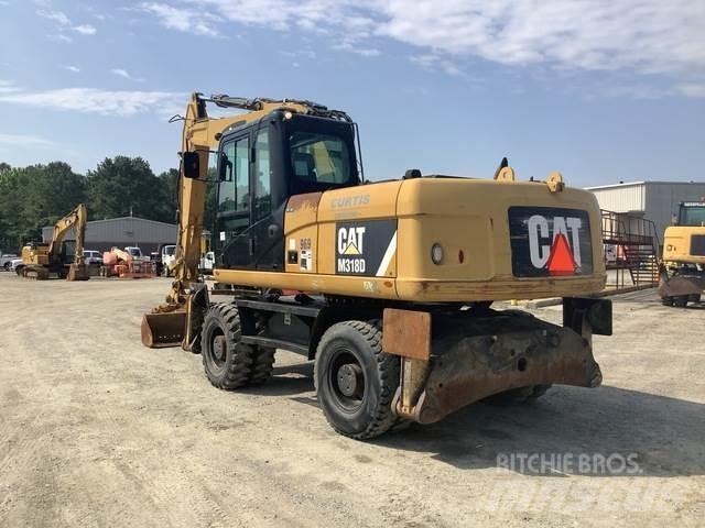 CAT M318D Hjulgravere