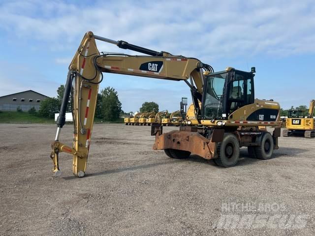 CAT M318D Hjulgravere