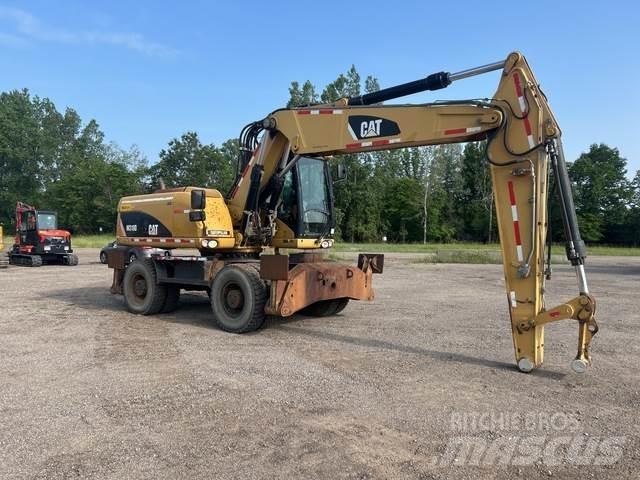 CAT M318D Hjulgravere