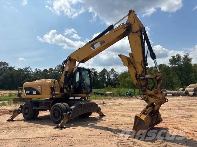 CAT M318D Hjulgravere