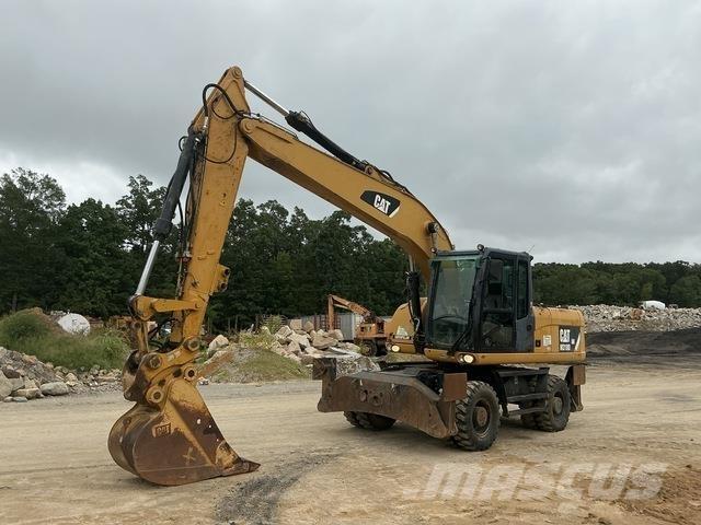CAT M318D Hjulgravere