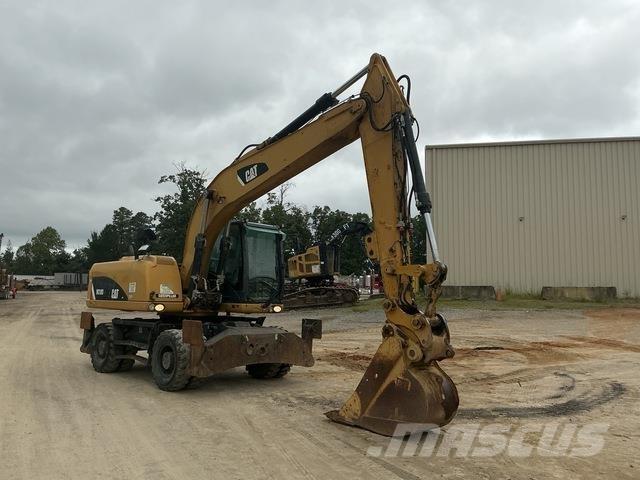 CAT M318D Hjulgravere