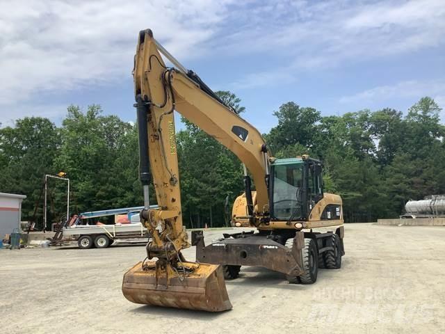 CAT M322D Hjulgravere