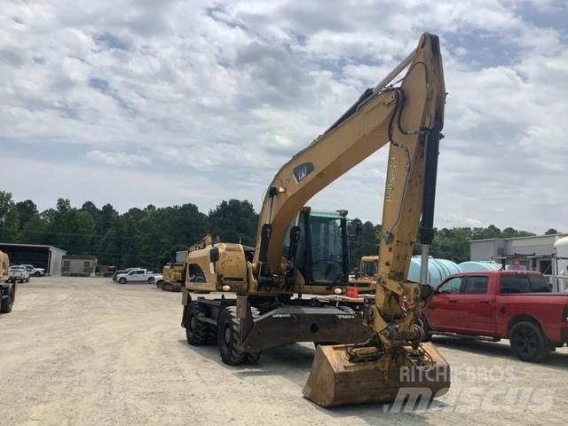 CAT M322D Hjulgravere